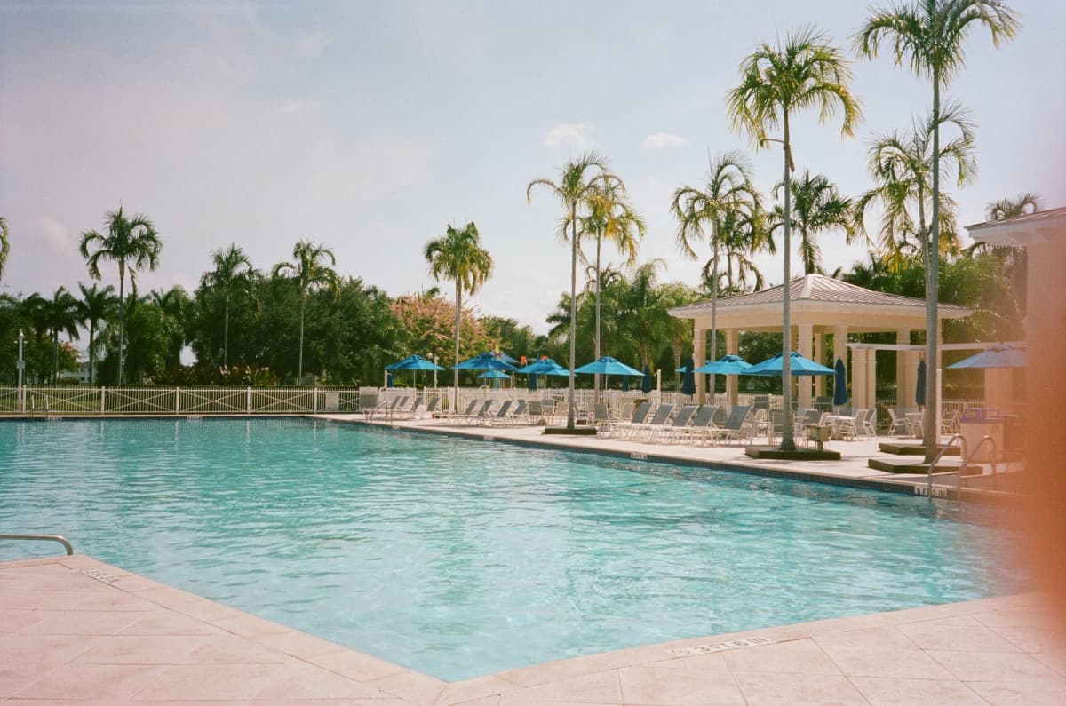 Children having fun while learning to swim with Miami swim instructors
